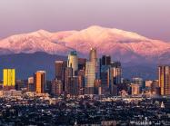 la skyline in front of mountains 