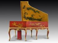 Red and yellow base with intricate, scrolling details in gold and green adorn this Auto Pleyela in a Chinoiserie Louis XV case. 