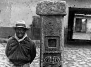 Detail of Peruvian archaeologist Julian C. Tello photographed standing next to the Tello Obelisk, named for his discovery.