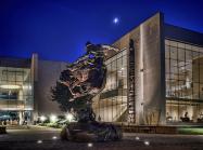 Exterior View of The Booth Western Art Museum in Cartersville, Georgia at night.