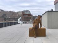 Installation View of Whitney Biennial 2022: Quiet as It's Kept featuring view of rooftop works by Charles Ray