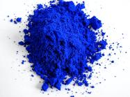 pile of Yinmn blue pigment in powder form from oregon state labs 