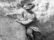 Hilda Petrie descending a ladder into an Egyptian Tomb.