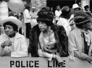 Dawoud Bey, Three Women at a Parade, Harlem, NY, from Harlem, U.S.A., 1978. Gelatin silver print (printed 2019). 11 x 14 in. Frame: 16 3/8 x 20 5/8 x 1 1/2 in.