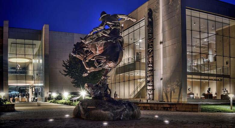 Exterior View of The Booth Western Art Museum in Cartersville, Georgia at night.