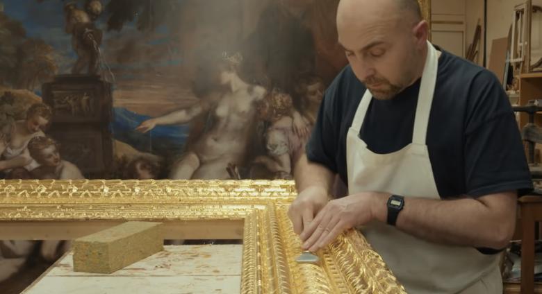 craftsman works on masterpiece frame