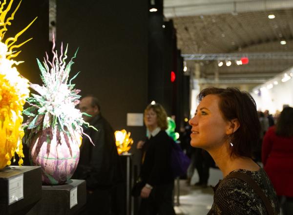 Woman looks at sculpture at SOFA